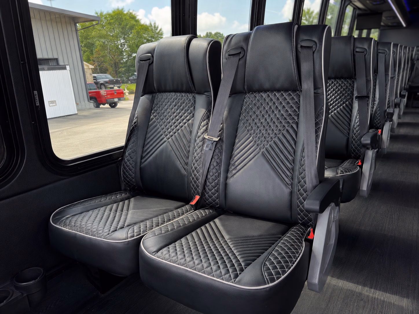 charter bus shuttle service between den and denver hotels and conference venues